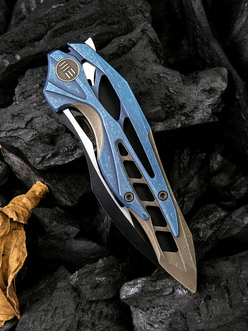 Flash Sale ✔️ We Knife Co. We Knife Arrakis Framelock Folder 906B, 3.45” Bohler M390 Black Wharncliffe Plain Blade, Blue and Bronze Stonewash Titanium Handle 👏 3 Flash Sale ✔️ We Knife Co. We Knife Arrakis Framelock Folder 906B, 3.45” Bohler M390 Black Wharncliffe Plain Blade, Blue and Bronze Stonewash Titanium Handle 👏 - Image 3