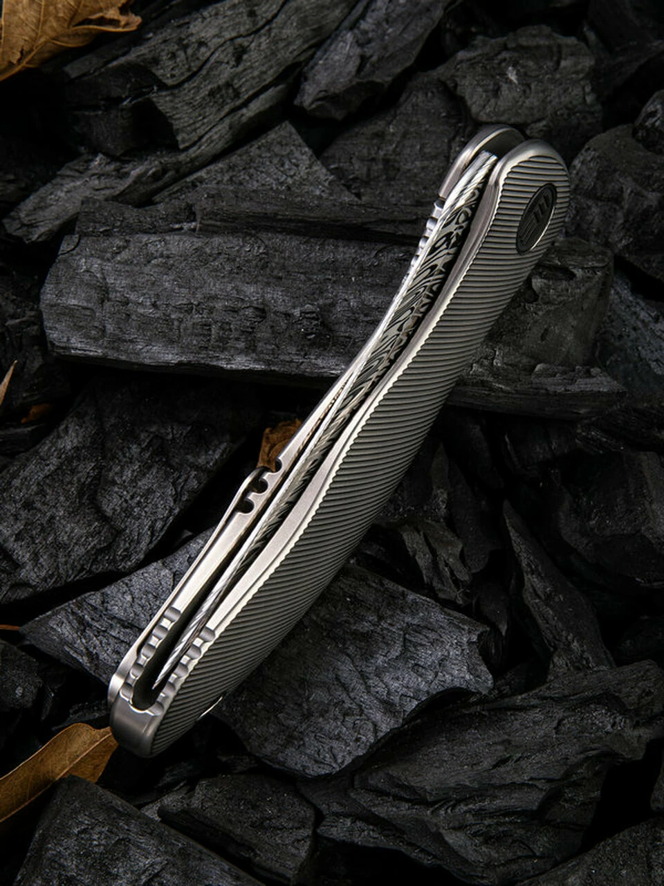 Outlet 🔥 We Knife Co. We Knife Synergy 2 Framelock Folder 912DS2, 3.49" Heimskringla Damasteel Tanto Plain Blade, 6AL4V Titanium Satin Polished Grooved Handle 🛒 5 Outlet 🔥 We Knife Co. We Knife Synergy 2 Framelock Folder 912DS2, 3.49" Heimskringla Damasteel Tanto Plain Blade, 6AL4V Titanium Satin Polished Grooved Handle 🛒 - Image 5