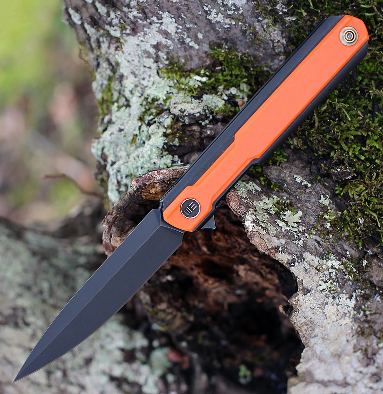 Deals ✨ WE Knife Co. Peer, 2015B, 3.5" CPM 20CV Black Blade, Black Titanium Handle with Orange G-10 Inlay ⭐ 1 Deals ✨ WE Knife Co. Peer, 2015B, 3.5" CPM 20CV Black Blade, Black Titanium Handle with Orange G-10 Inlay ⭐