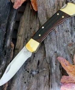 Wholesale 👍 Buck Knives Buck BU110FG Folding Hunter, 3.75" 420HC Plain Blade, Finger Grooved Woodgrain Handle, Leather Sheath ✔️